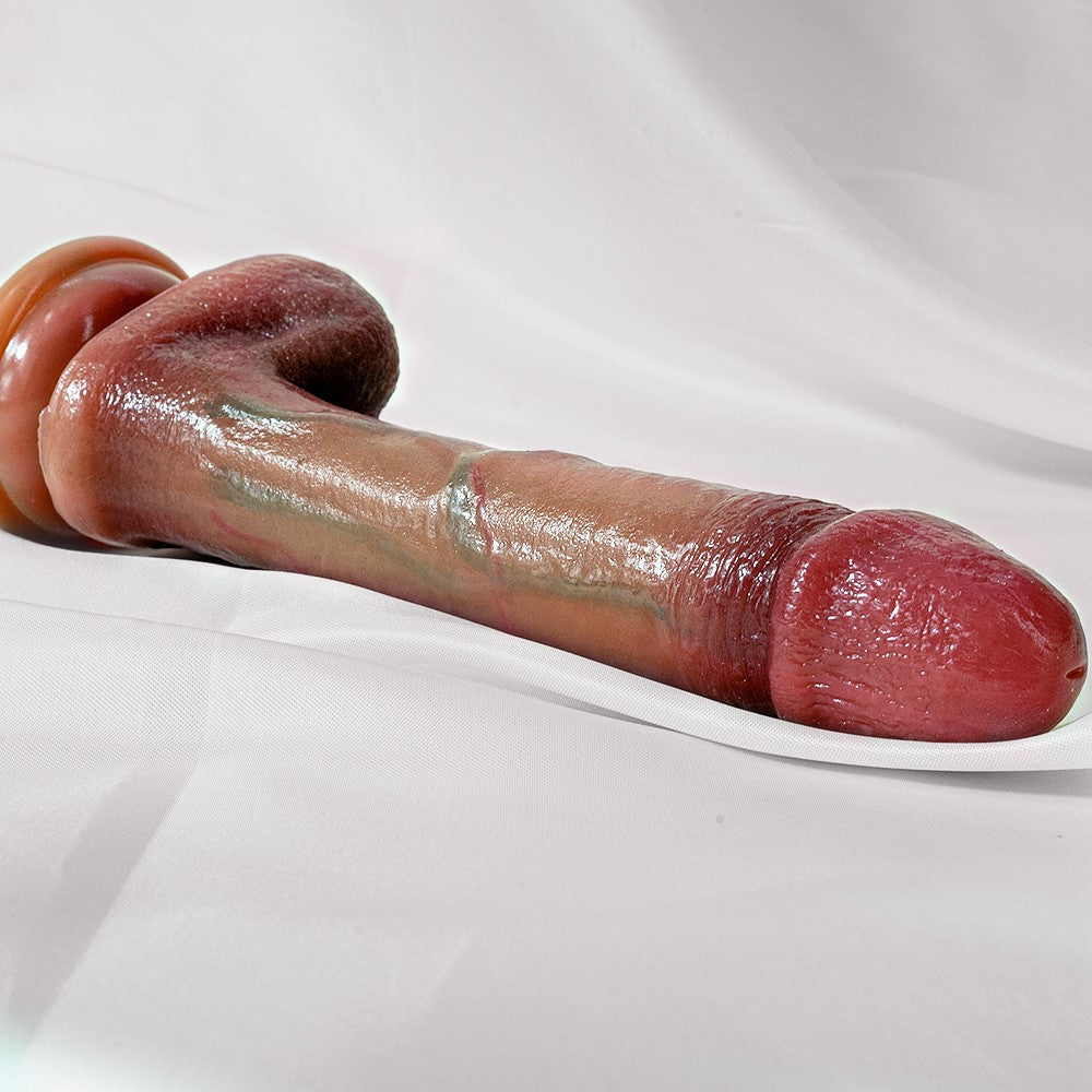 realistic-small-dildo-with-suction-cup-lying-on-the-cloth